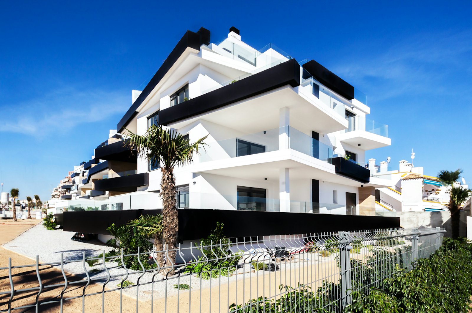 Modern multifamily apartment building where renters can benefit from energy rebate programs